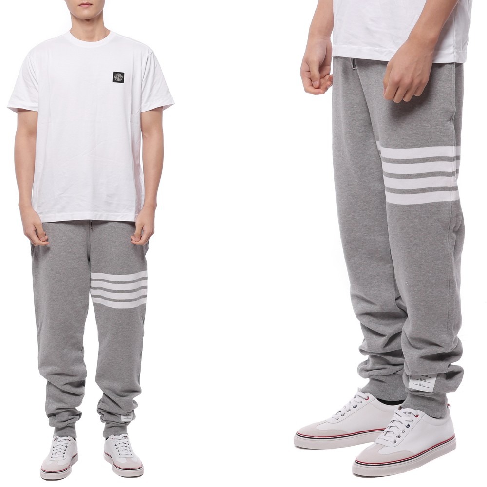 23FW Men's Diagonal Stripe Jogger Pants (MJQ008H 00535 068 23F)