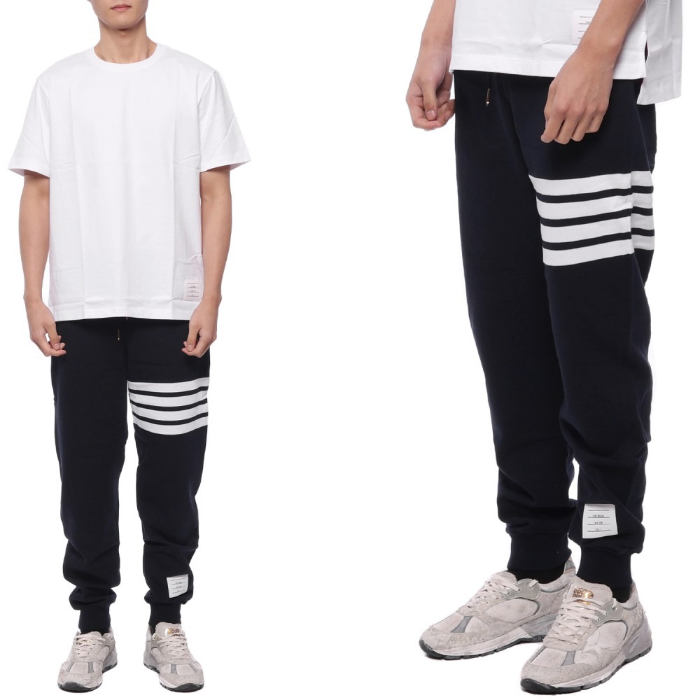23FW 남성 사선 스트라이프 조거 팬츠 (MJQ008H 00535 461 23F)